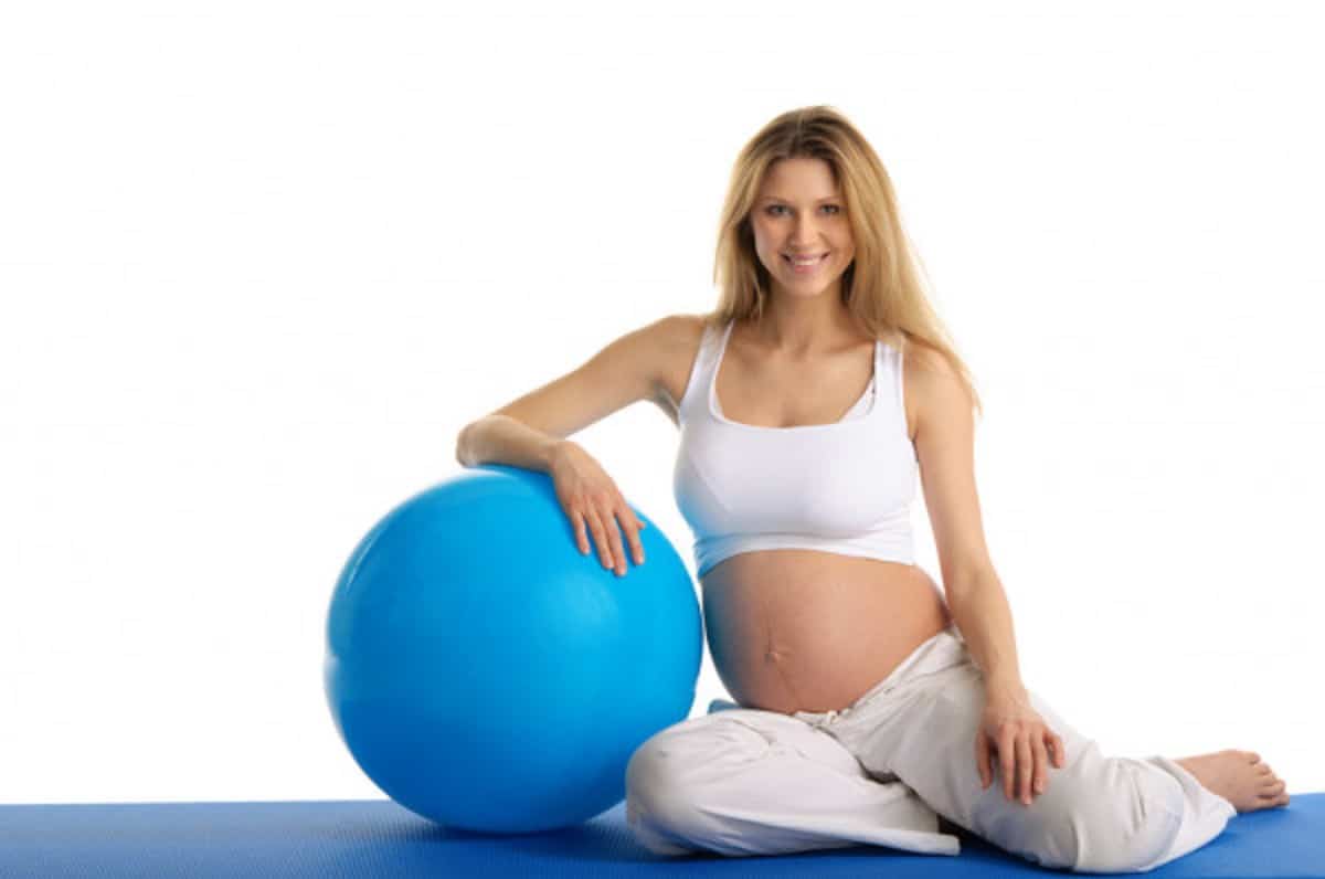 depositphotos 5953126 stock photo pregnant woman excercises with gymnastic