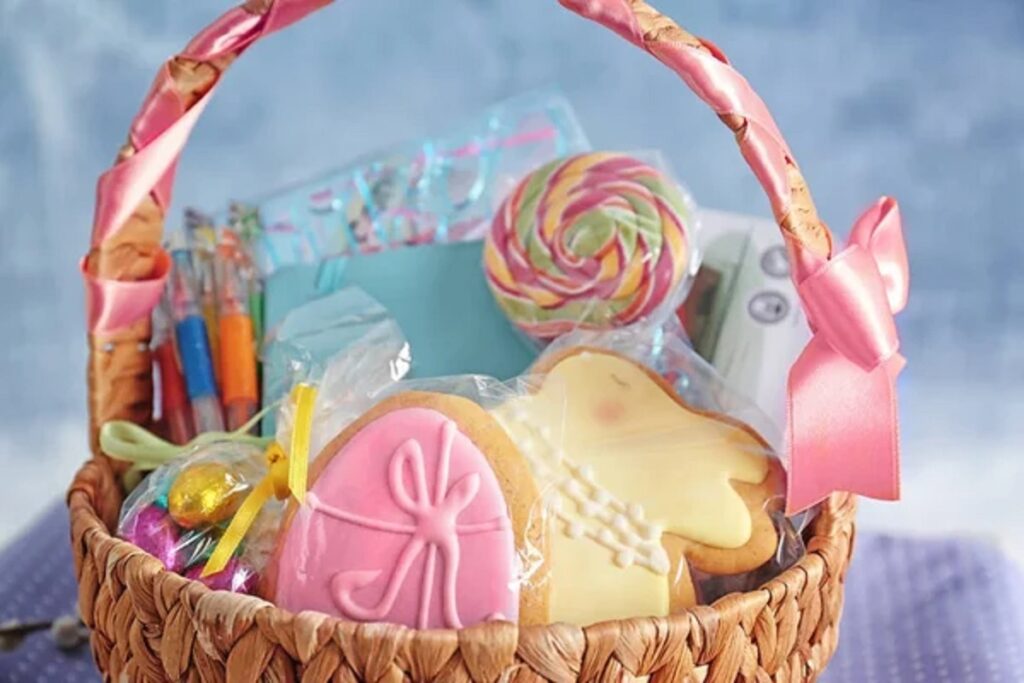 depositphotos 147580623 stock photo easter basket with sweets and